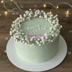 Elegant Eggless Sage Green Birthday Cake with Fresh Baby’s Breath