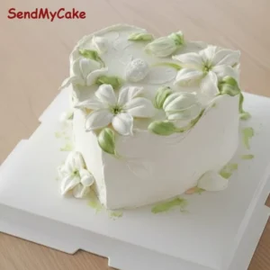 White Heart-Shaped Floral Cream Cake(Eggless)