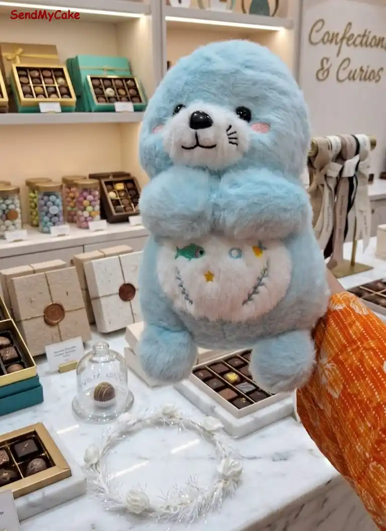 Adorable Blue Sea Otter Plush Toy with Embroidered Belly Detail 30 cm